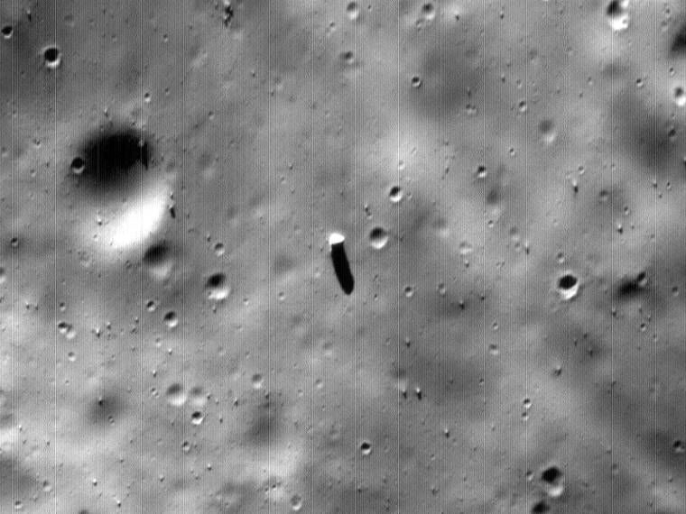 The monolith: the bright-topped object with the long shadow, cropped from full-resolution Mars Global Surveyor frame SP2-55103 (September 1998). Pixel aspect is as archived.