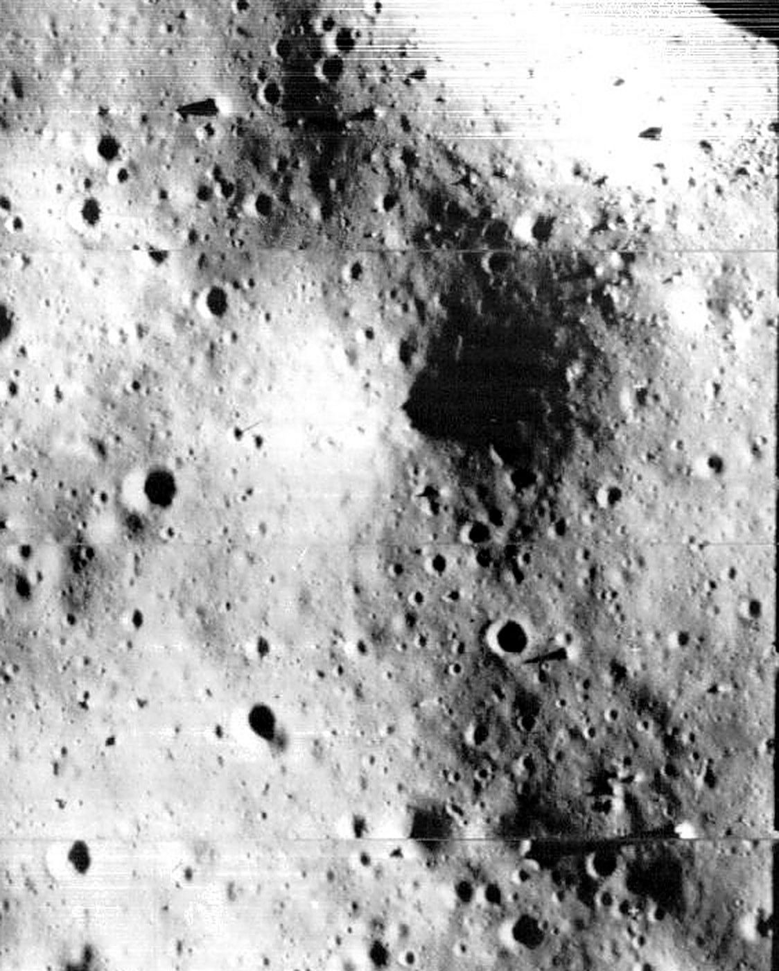 Lunar Orbiter II frame 61 (H3), November 1966: the Blair cuspids in Mare Tranquillitatis, the long pointed shadows near the top of the frame.