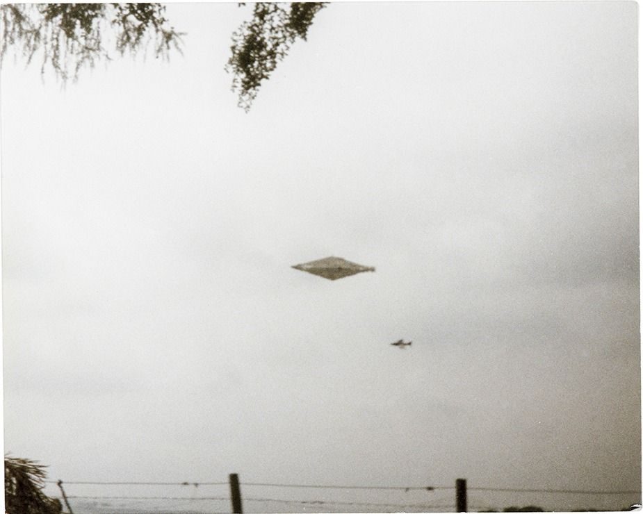 The Calvine photograph (4 August 1990): a diamond-shaped object with a jet below it. Print kept by former RAF press officer Craig Lindsay, released 2022.