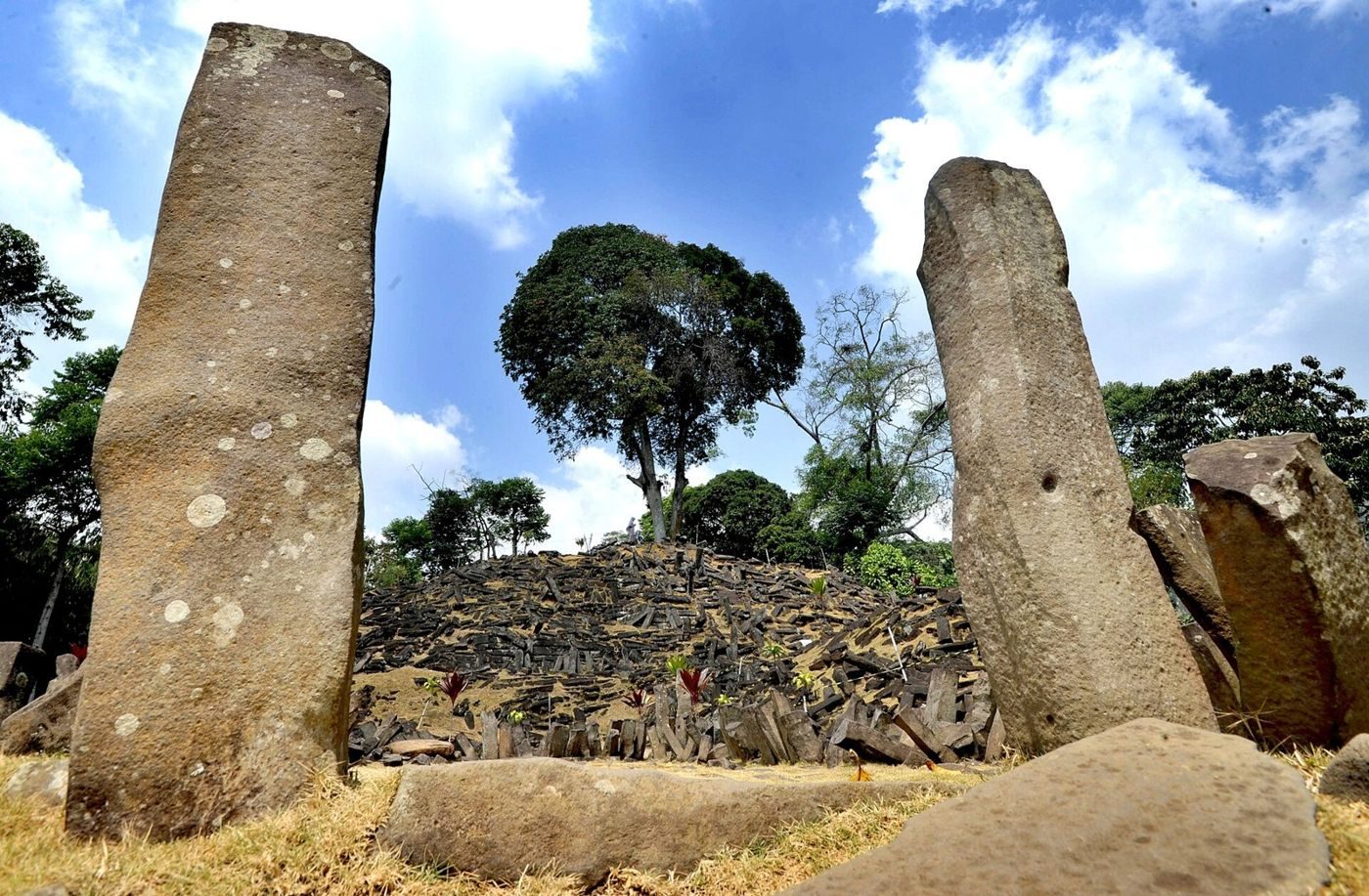 Standing stones and heaps of columnar andesite on the terraces of Gunung Padang, Cianjur, West Java (2019).