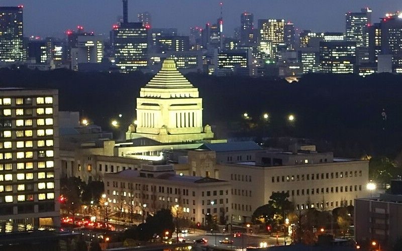 The National Diet Building, Tokyo, lit at dusk, 18 February 2015 (cropped from a wider city view).
