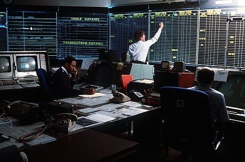 Context: the System Control Division at NORAD's Cheyenne Mountain Complex, 1 April 1984. Not the chase Col. Cobb describes; its date is not given in the film.
