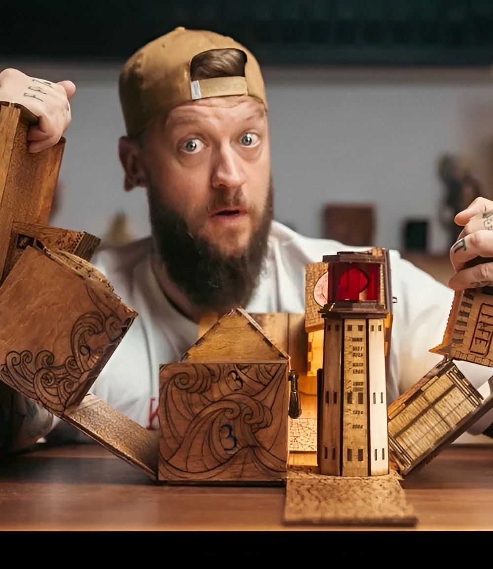 Chris Ramsay, Canadian magician, puzzle-solver and YouTuber, with one of his puzzle boxes (cropped).