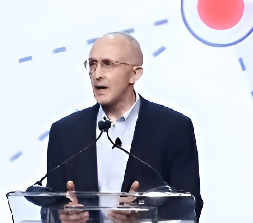 Peter Highnam speaking at the 2017 GEOINT Symposium, from DARPA's announcement of his appointment as deputy director.