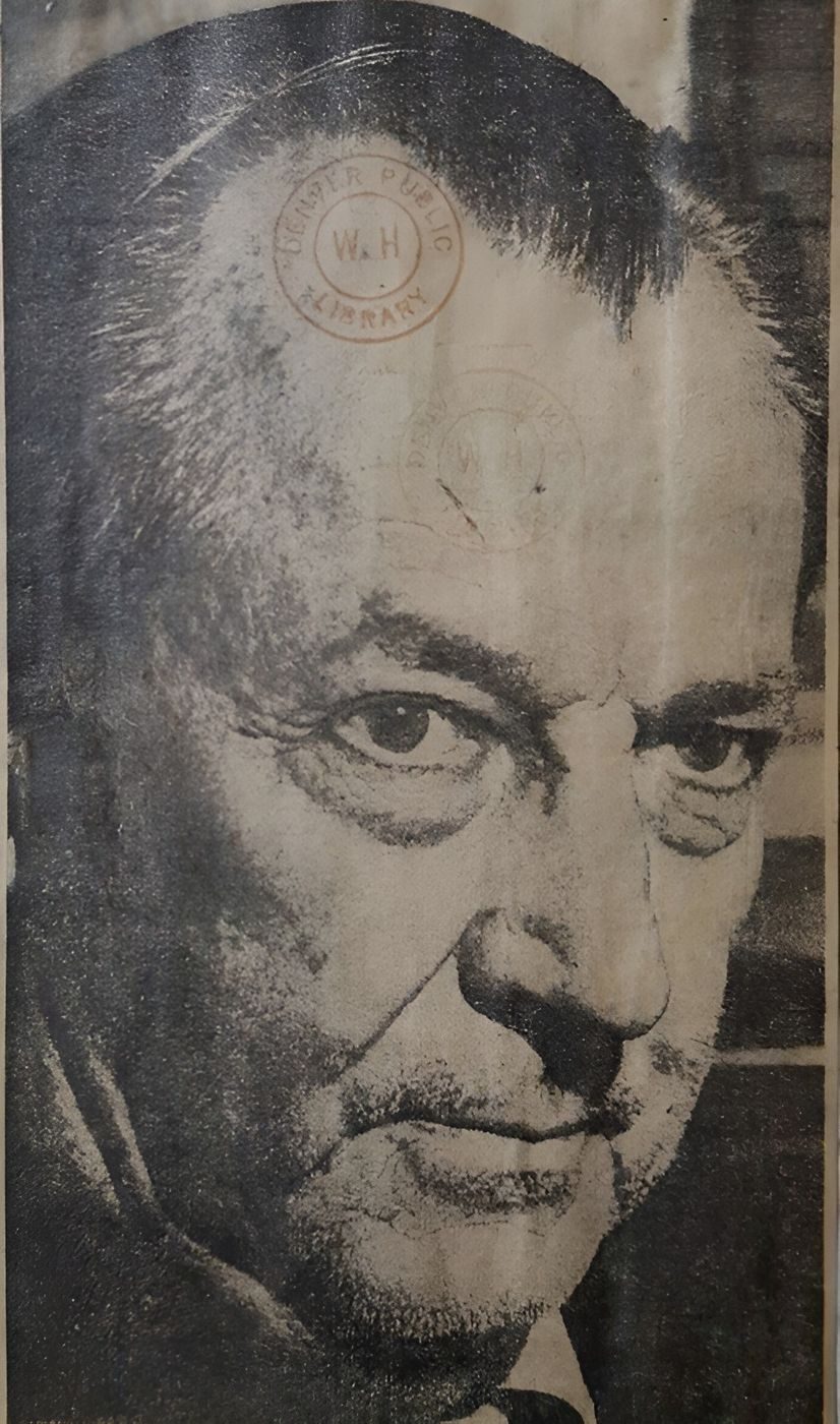 Silas M. Newton, the oilman behind the Aztec crashed-saucer story, photographed when he was jailed in Denver on bunco charges, December 1952 (newspaper clipping, cropped; the red mark on his forehead is the Denver Public Library's ownership stamp on the clipping).