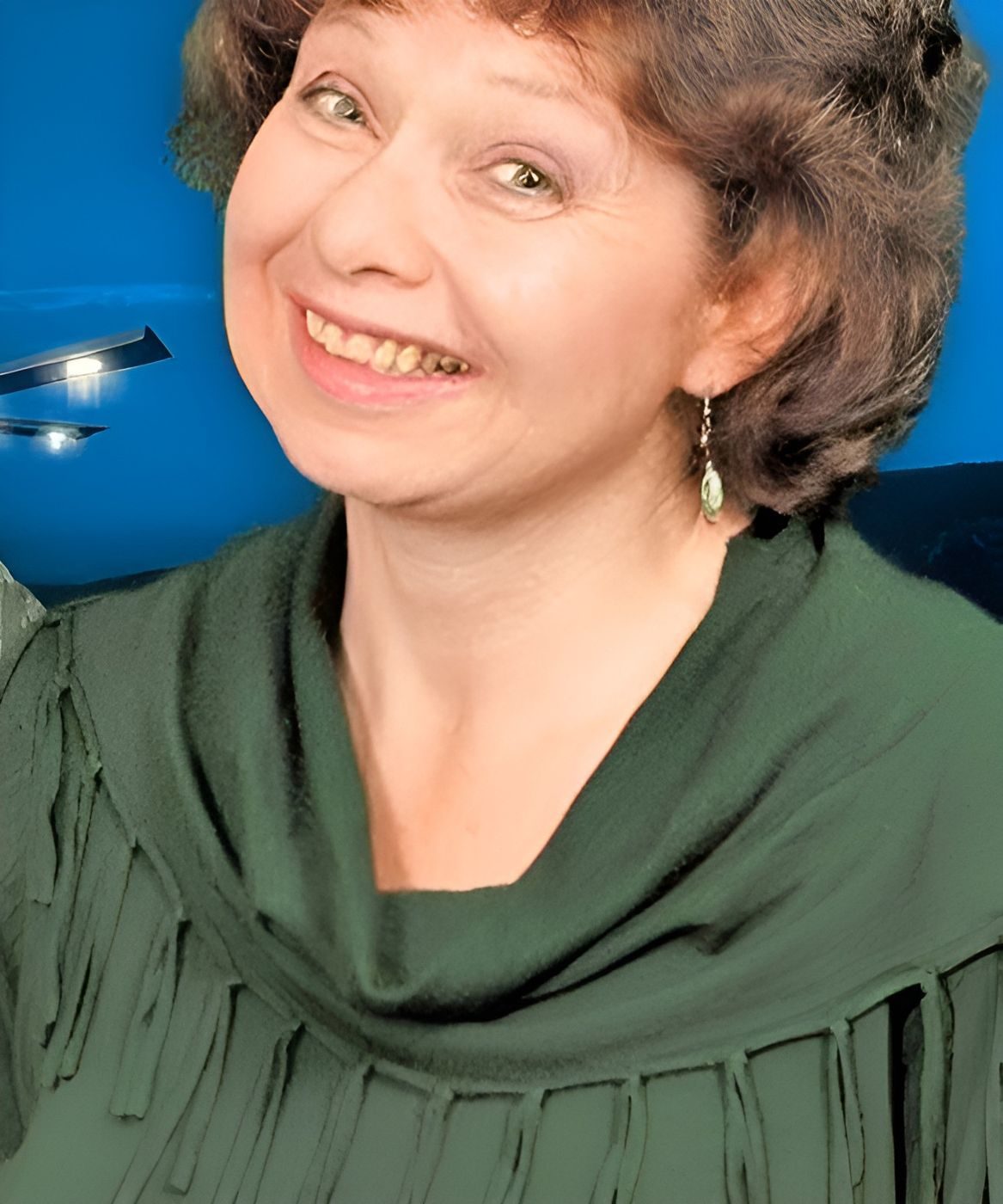 Suzanne Ramsey, co-author of 'The Aztec UFO Incident', in the publicity photo used for a 2019 Podcast UFO interview (cut from the thumbnail; Scott Ramsey is beside her, out of frame at left).