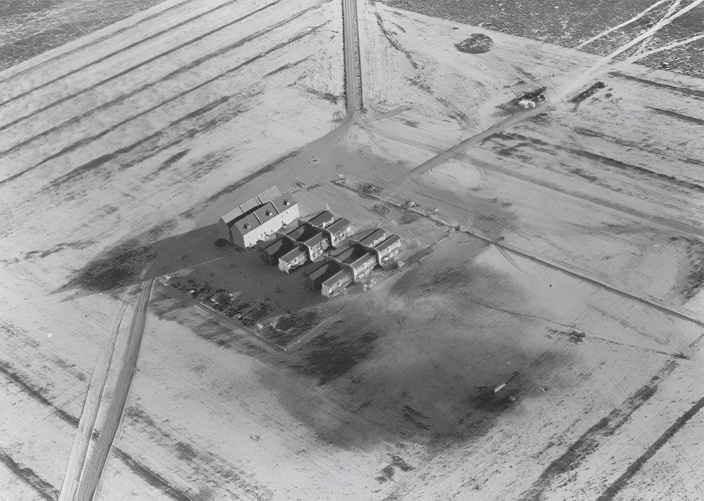 Aerial view of the German and Japanese test villages at Dugway Proving Ground, Utah, built in 1943 to test incendiary bombs on typical housing.