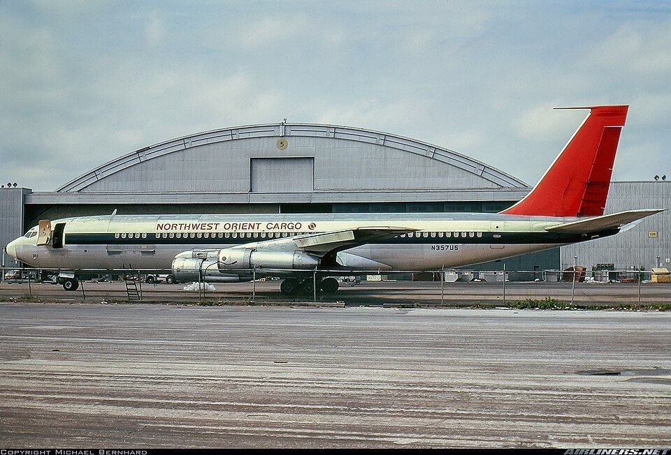Context, not the event: a Northwest Orient Cargo Boeing 707-351C (N357US) at New York JFK, 1 June 1973. The defence ministry said the aircraft fired on over Seoul on 14 Oct 1976 was a Northwest Boeing 707 cargo charter, flight 902; this is the same type and livery, not that aircraft.