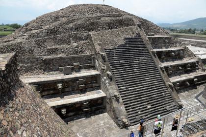 The Temple of the Feathered Serpent at Teotihuacan, with its carved serpent heads. A separate tunnel, found beneath this temple in 2003, was later excavated.