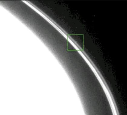 A kink tracked along the F ring (two video grabs)