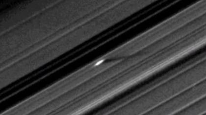A moonlet with a wake beside a ring gap (video grab)