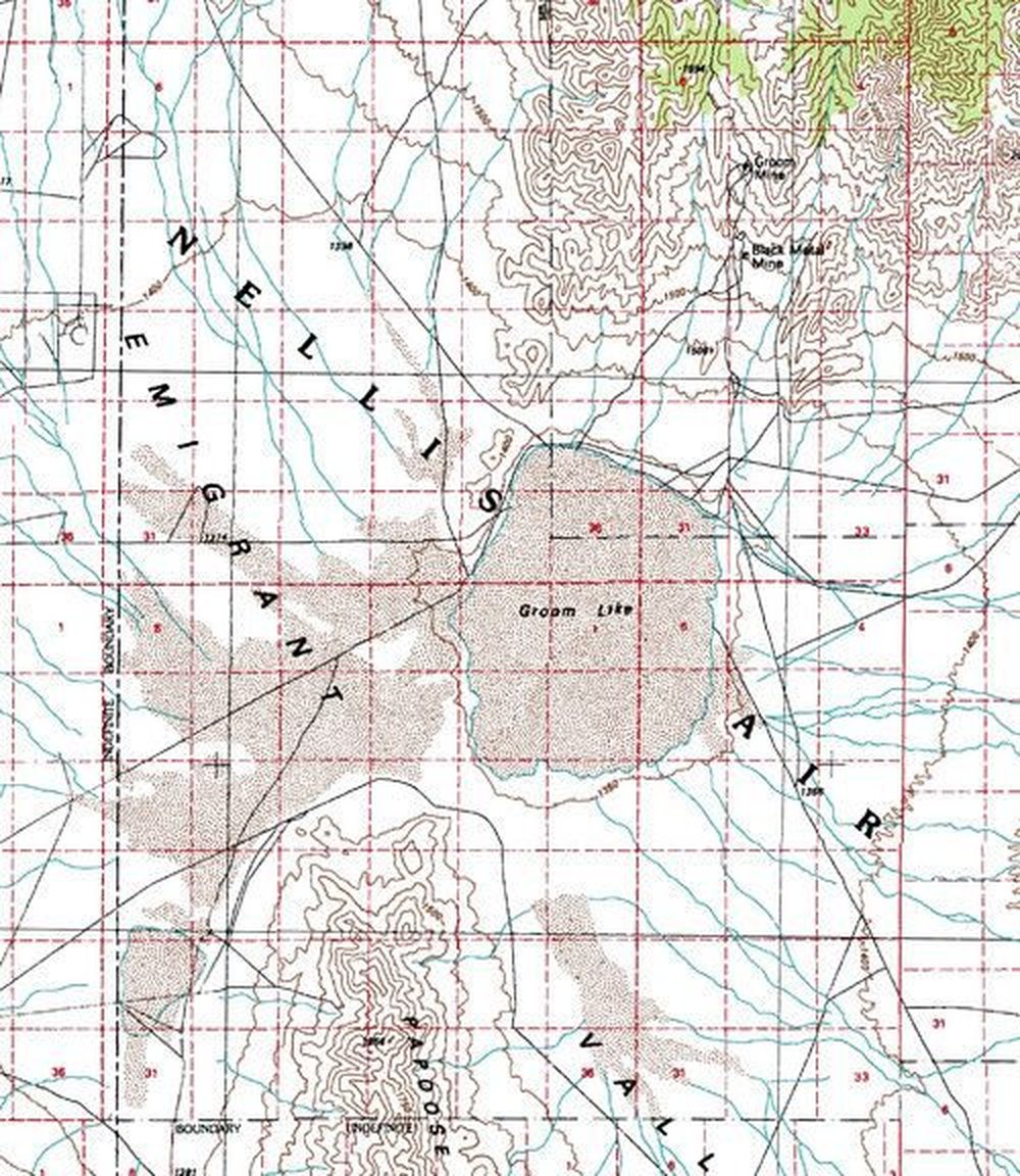 USGS topographic map of Groom Dry Lake, Nevada, inside the Nellis Air Force Range (montage of USGS map sheets). The Groom Lake base and its runways are not drawn on the map. The 1984 withdrawal (Public Law 98-485, about 89,600 acres) took in the public land around this area; the withdrawal boundary is not marked here.